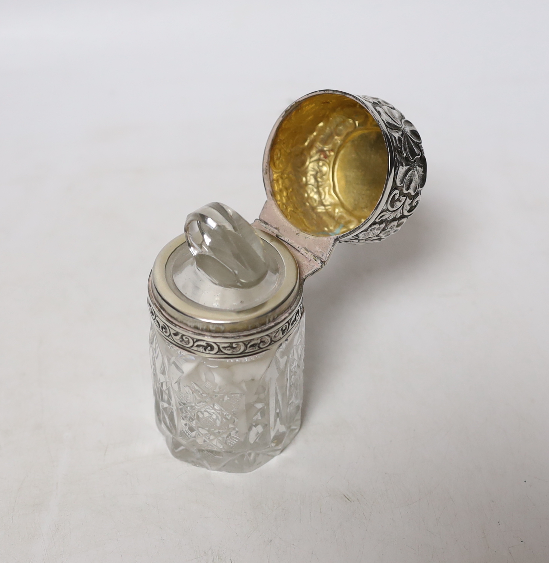 Four silver mustard ladles, including two 19th century, two plated ladles and an Edwardian silver mounted glass salts jar, London, 1905, 94mm.